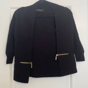 Black with gold hardware cardigan.